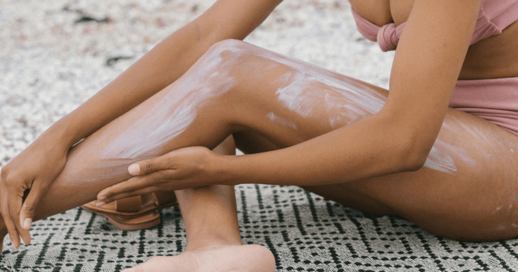 A lady with cream on how long does sunscreen last on skin once applied.